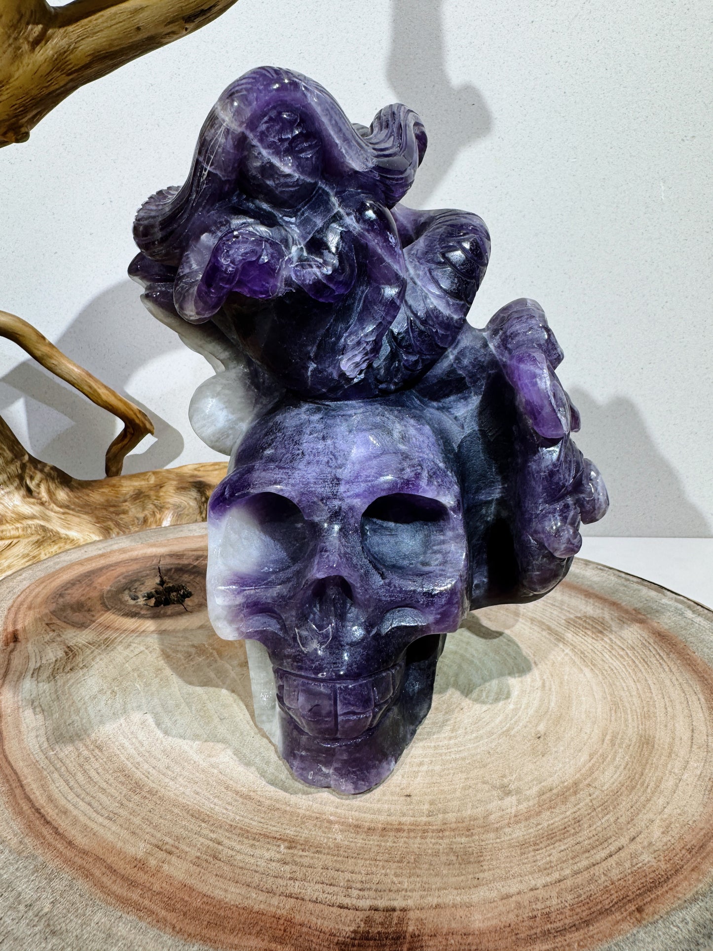 Deep purple amethyst skull with siren